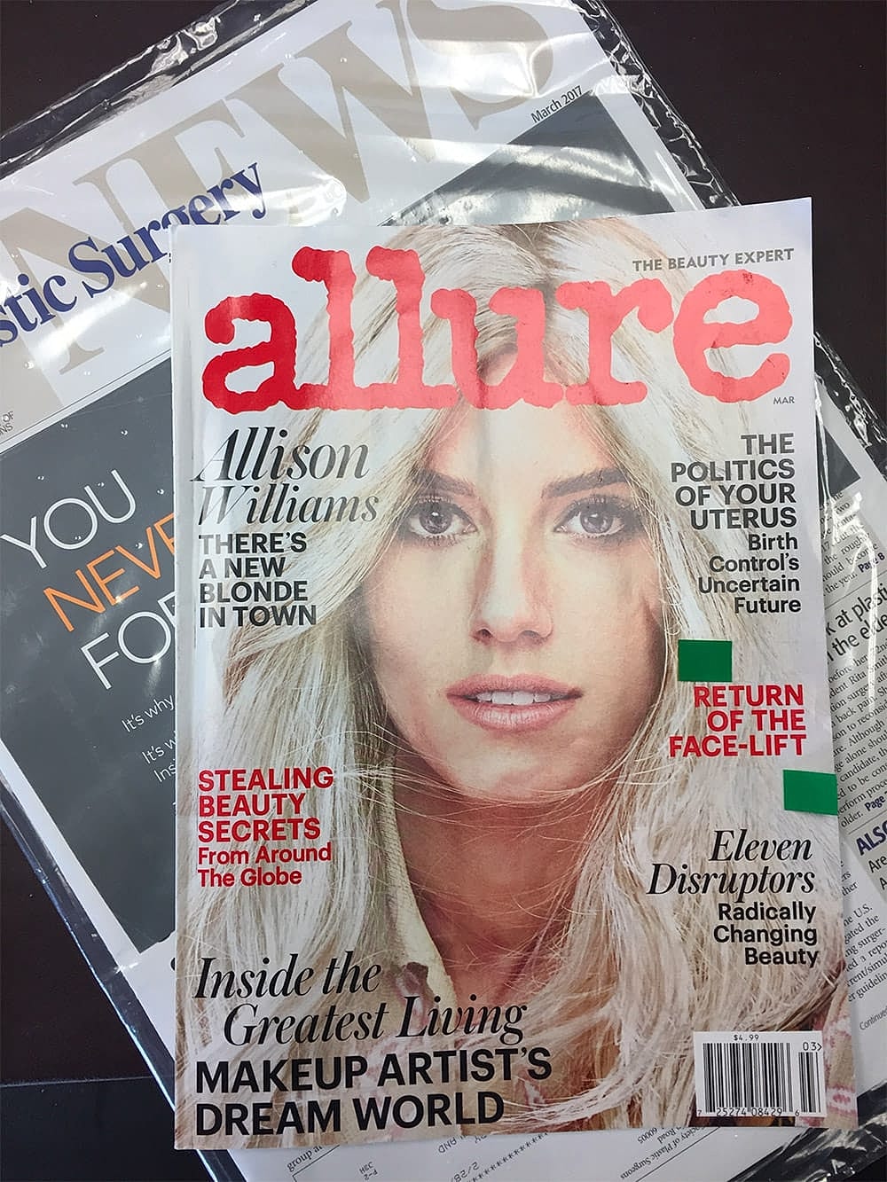 Cover of Allure magazine featuring beauty articles.