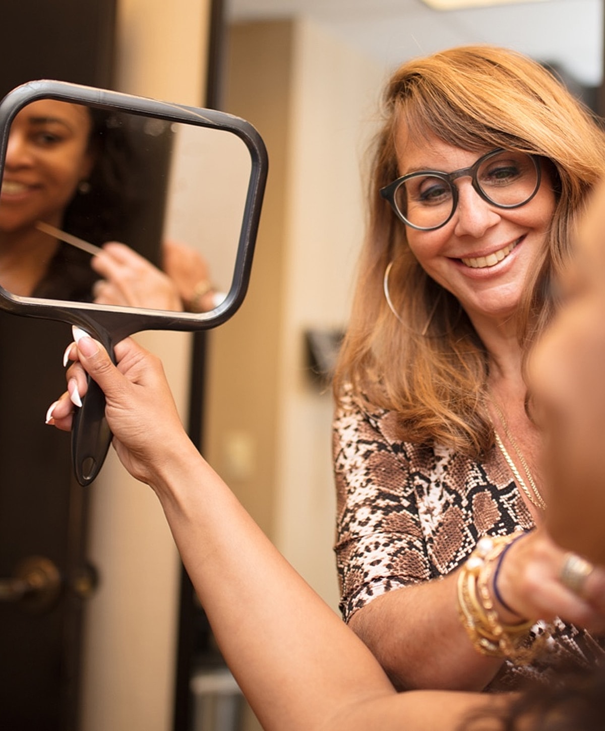 Model in brown swimwear posing confidently.